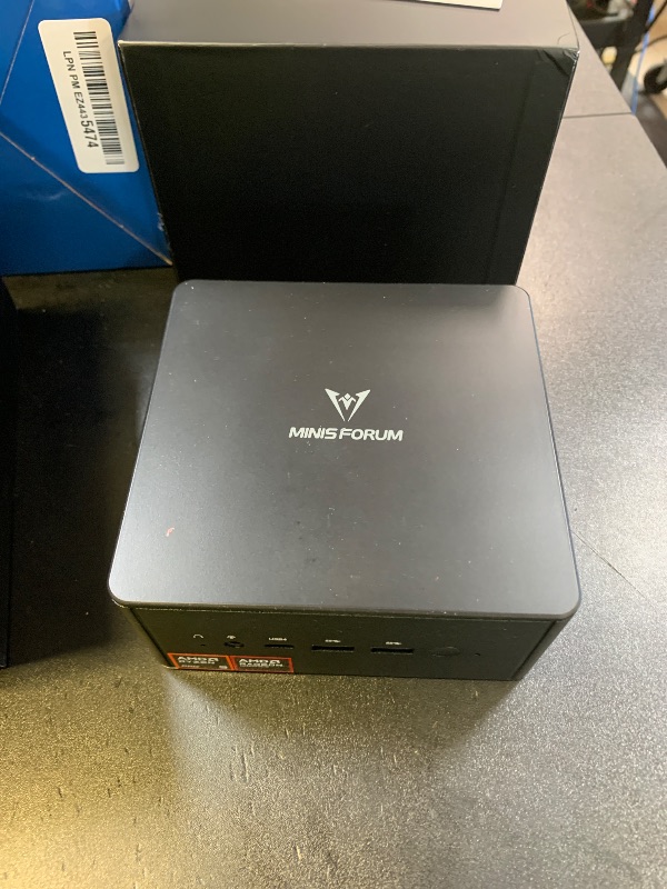 Photo 1 of MINISFORUM UM890 Pro Mini PC Ryzen 9 8945HS (up to 5.2GHz) Desktop Computer 64GB RAM DDR5 5600MHz &1TB PCIe 4.0 SSD, Cculink Mini PC Quad Display HDMI/DP1.4/USB-C, AMD Radeon 780M/Dual LAN 2.5G