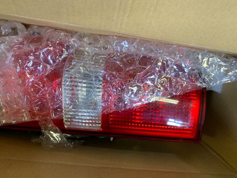 Photo 1 of TYC 11-6838-00-1 Replacement left Tail Lamp