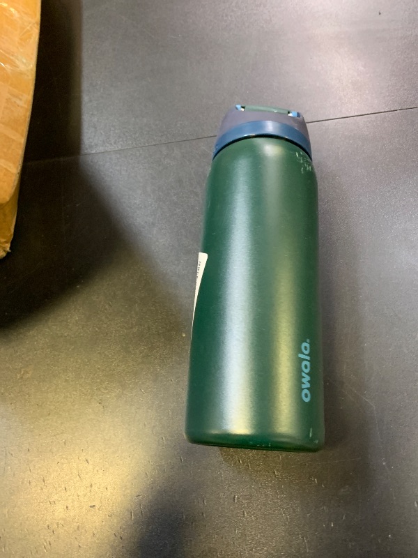 Photo 1 of Owala FreeSip Insulated Stainless Steel Water Bottle with Straw, BPA-Free Sports Water Bottle, Great for Travel, 32 Oz, Lost Signal