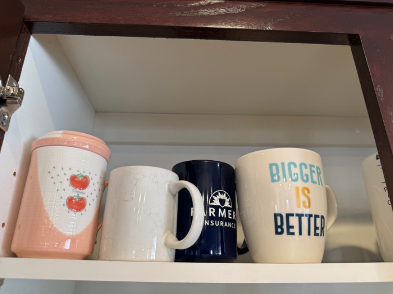 Photo 1 of CONTENTS OF KITCHEN CABINET-GLASSWARE & CUPS