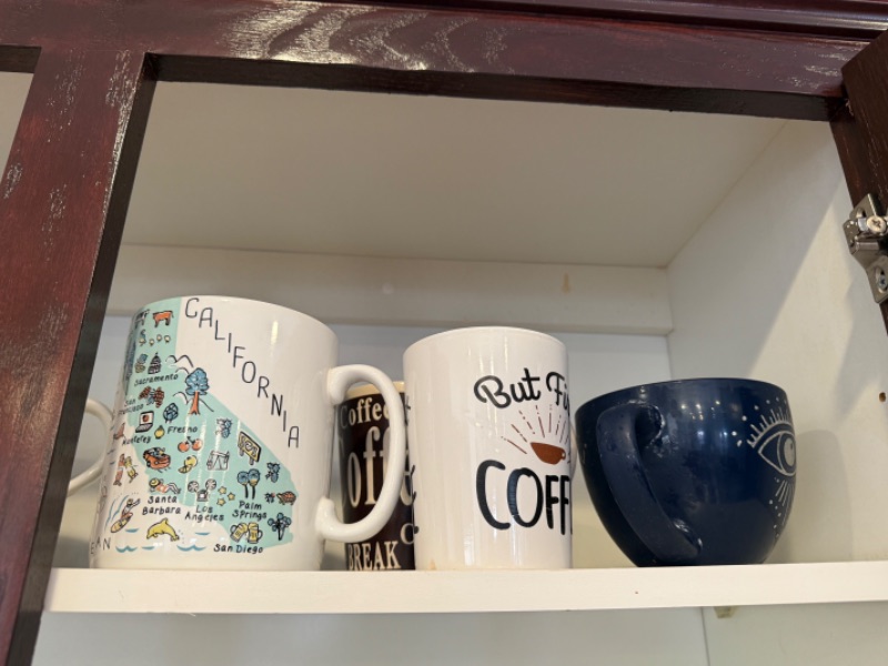 Photo 1 of CONTENTS OF KITCHEN CABINET-GLASSWARE & CUPS