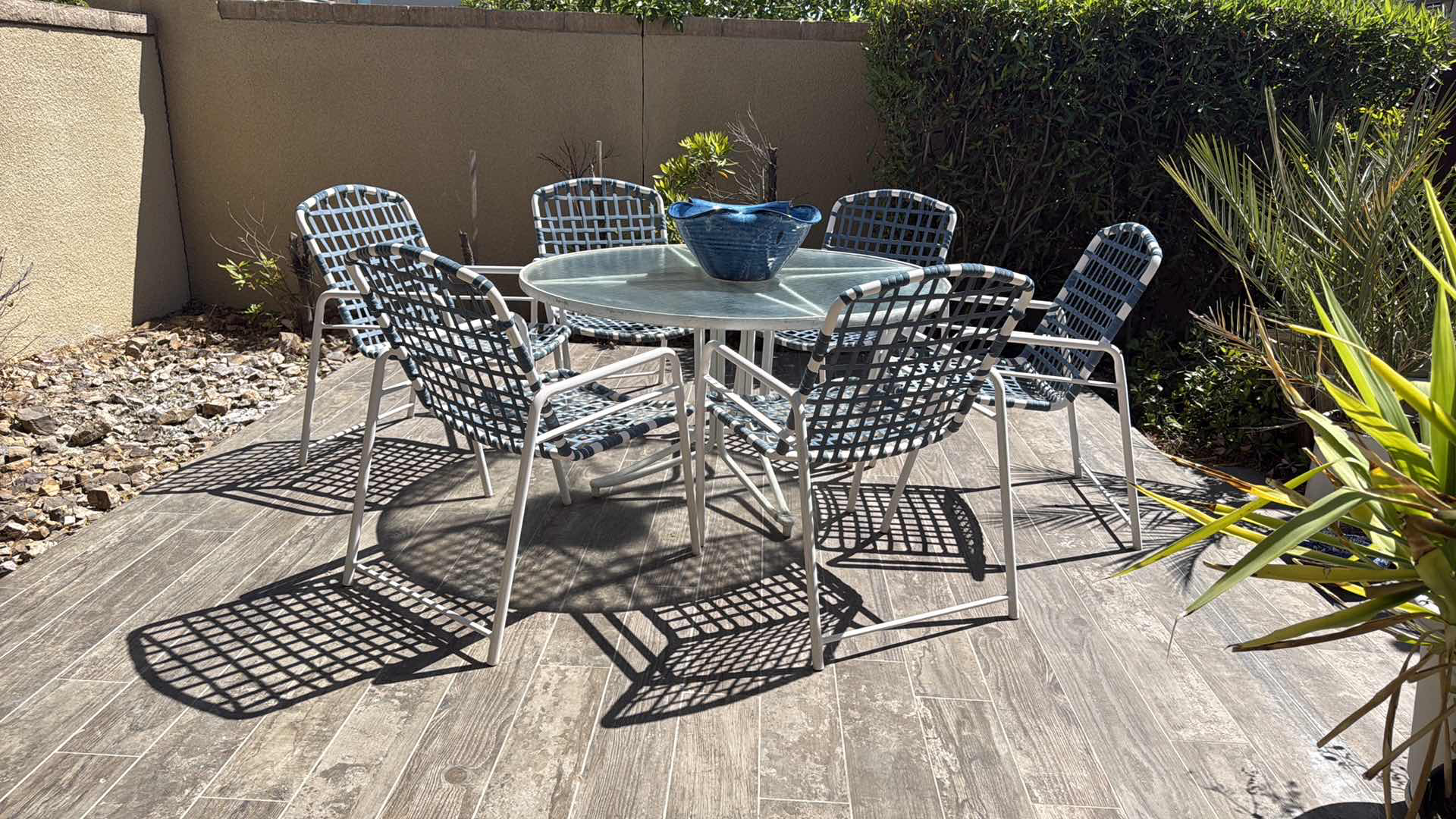 Photo 1 of 48” ROUND WHITE METAL PATIO TABLE  W GLASS TOP & 6 ARM CHAIRS