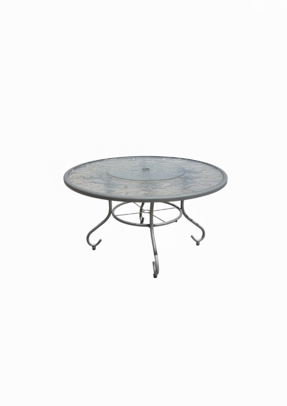 Photo 1 of GREY PATIO DINING TABLE W CIRCULAR GLASS TOP ETCHED W LEAF DESIGNS & INTEGRATED LASY SUSAN 60" CHAIRS SOLD SEPARATELY
