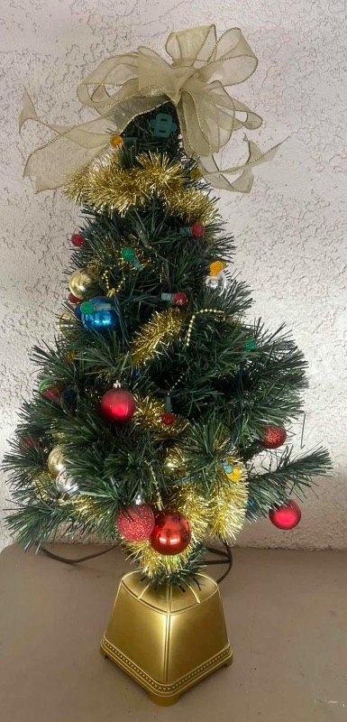 Photo 1 of DECORATED MINATURE CHRISTMAS TREE W LIGHTS  H30”