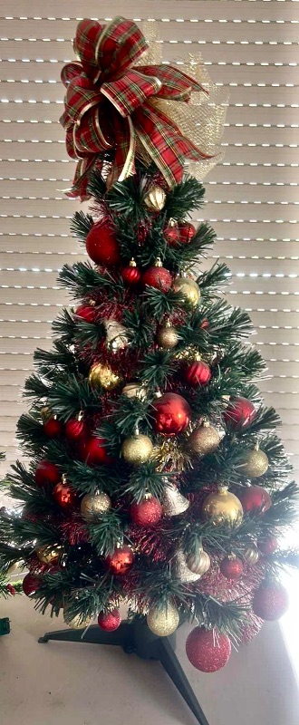 Photo 1 of DECORATED MINATURE CHRISTMAS TREE W RED PLAID BOW H32”