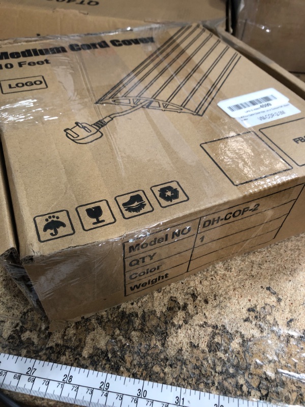 Photo 1 of 10ft Floor Cable Cover Heavy Duty PVC Cord Cover Wire Cover to Prevent Trip Hazard for Home Office or Outdoor(10ft, Black)