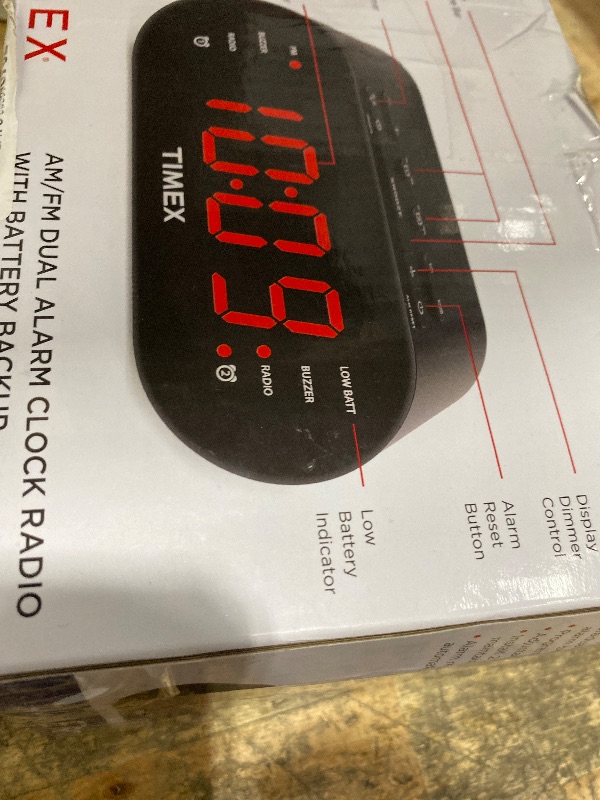Photo 1 of Timex T231G AM/FM Dual Alarm Clock Radio with 1.2-Inch Display and Line-in Jack (Gunmetal)