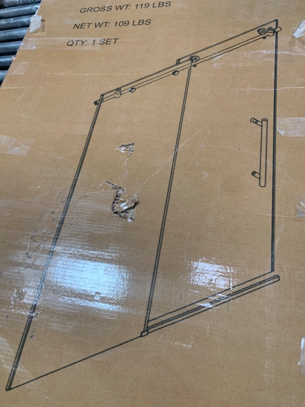 Photo 1 of ** Missing the frame only glass included has a minor scratch on it see pics *** ENSO SENKA 56-60” W x 76” H Frameless Sliding Shower Door, 5/16" (8mm) SGCC Tempered Clear Glass with Easy-to-Clean Coating, Brushed Gold