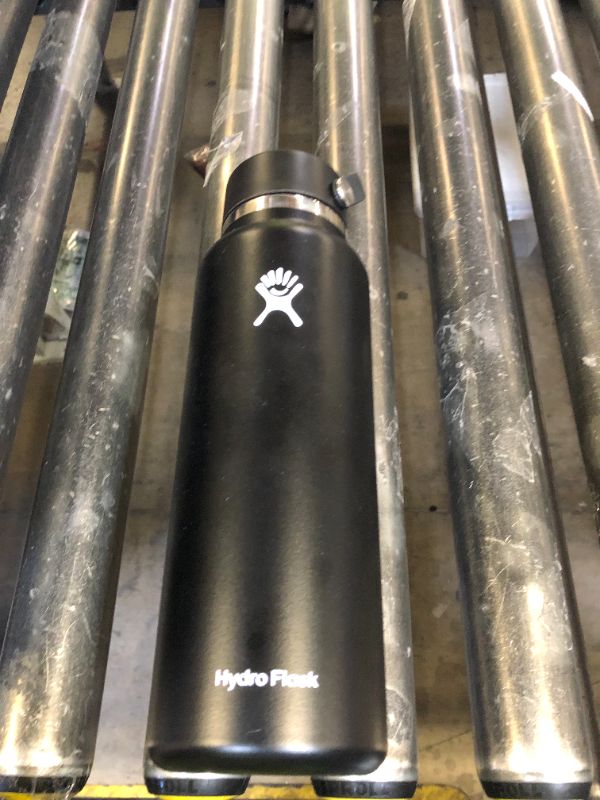 Photo 1 of Hydro Flask Water Bottle - Insulated Stainless Steel - Wide Straw Lid, Non Spill, Leakproof in 40 Oz Black