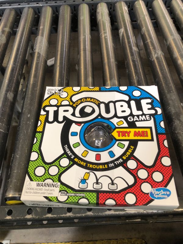 Photo 1 of Hasbro Gaming Trouble Kids Board Game, Pop-o-Matic Trouble Game, Kids Games for 2-4 Players, Family Board Games for Kids, Kids Gifts, Ages 5 and Up, Packaging May Vary