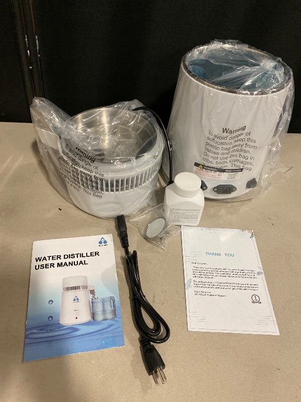 Photo 1 of DC HOUSE 1 Gallon Water Distiller Machine, 750W 4L Pure Distilled Water Maker Machine for Home Countertop Table Desktop, Drinking Purifier for Home Kitchen CPAP Hmidifiers with Pastic Container