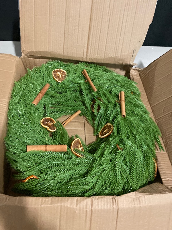 Photo 1 of 24INCH Real Touch Norfolk Pine Wreath, Christmas Wreaths for Front Door with Natural Dried Orange Slices and Cinnamon Artificial Green Wreath Holiday Decoration for Indoor Outdoor Home Decor