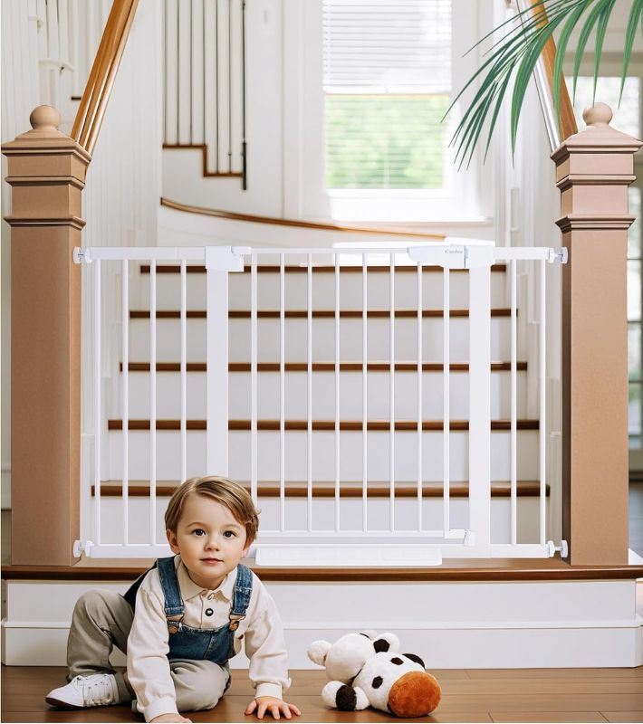 Photo 1 of Cumbor 29.7-48" Baby Gate for Stairs, Mom's Choice Awards Winner-Dog Gates for Doorways, Auto Close Safety Pet Gate for Dogs Indoor, Easy Install Pressure Mounted Child Gate with Walk Thru Door, White