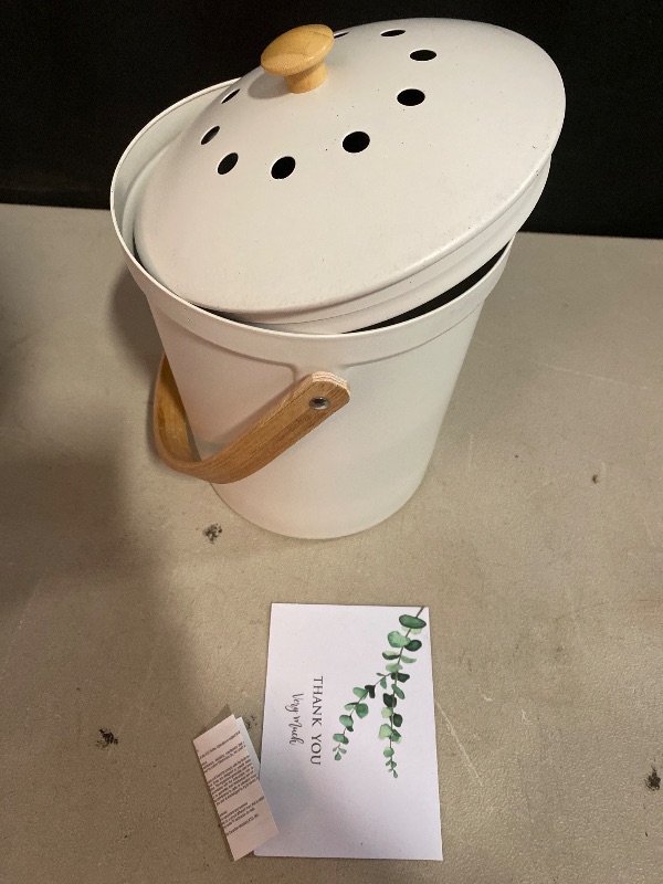 Photo 1 of Beautiful Kitchen Compost Bin with Smell Proof Lid - Rust Proof and Odorless Compost Bucket for Your Countertop with No Smell Filters - Easy to Clean 1.1 Gallon Bin Looks Great On Any Kitchen Counter
