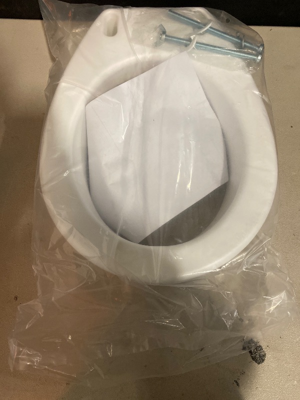 Photo 1 of Carex Toilet Seat Riser, Elongated Raised Toilet Seat Adds 3.5 inches to Toilet Height, for Assistance Bending or Sitting, 300 Pound Weight Capacity Toilet Riser