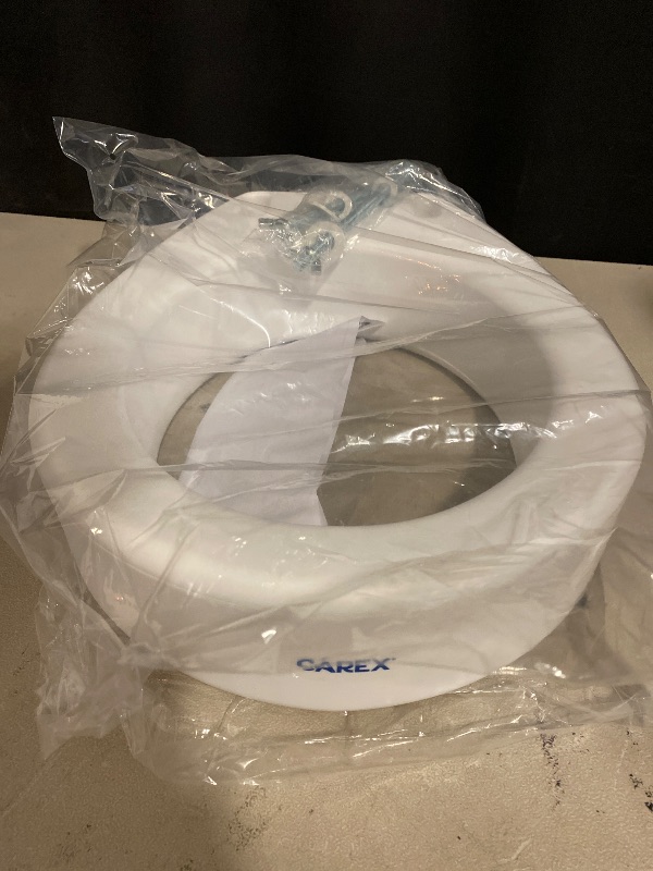 Photo 1 of Carex Toilet Seat Riser, Elongated Raised Toilet Seat Adds 3.5 inches to Toilet Height, for Assistance Bending or Sitting, 300 Pound Weight Capacity Toilet Riser