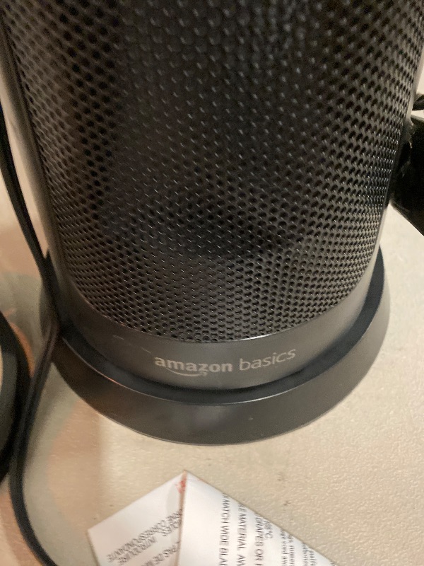 Photo 1 of Amazon Basics 28-Inch Oscillating Tower Heater, With Over-Heat and Tip-Over Protection, 2 Heat Settings and Fan Mode, Timer, Remote Control, LED Display, 1500W, Black, 9.4"D x 9.4"W x 28.6"H