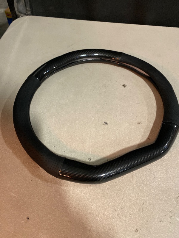 Photo 1 of Car Carbon Fiber and Leather D-Shape Steering Wheel Cover, Stylish car Non-Slip Leather car Interior 15 inches Universal Black
