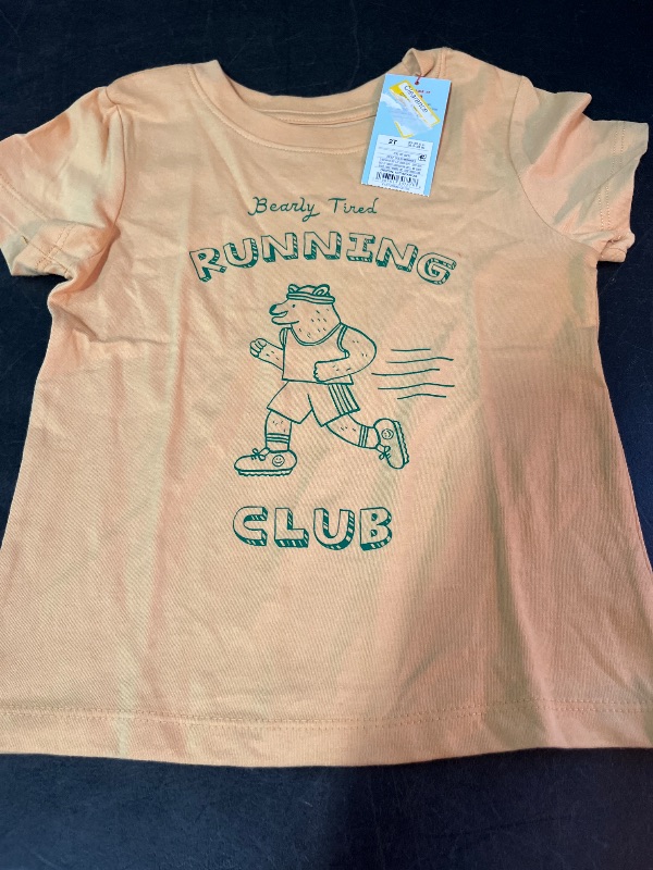 Photo 1 of 2T Toddler Boys' Short Sleeve Graphic T-Shirt - Cat & Jack™ Yellow 2T
