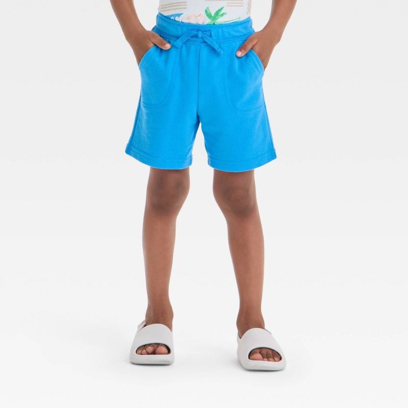 Photo 1 of 12M Toddler Boys' Pull-on Knit Shorts - Cat & Jack™ Blue 12M: Cotton Blend, Recycled Polyester, Midweight, Inside Pocket, Elastic Waistband