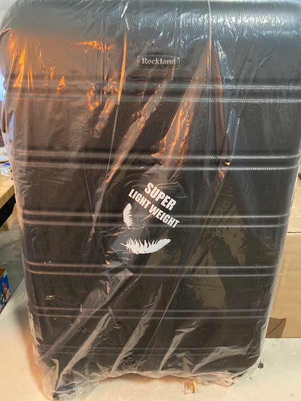 Photo 1 of Rockland Melbourne Hardside Expandable Spinner Wheel Luggage, Black, Checked Large 28"