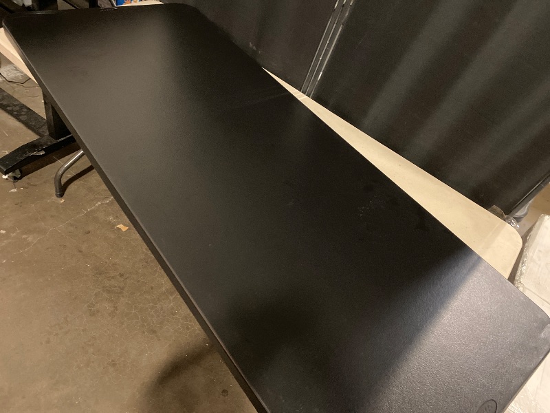 Photo 1 of Cosco 2.5-ft x 6-ft Indoor or outdoor Rectangle Resin Black Folding banquet table 8 -Person