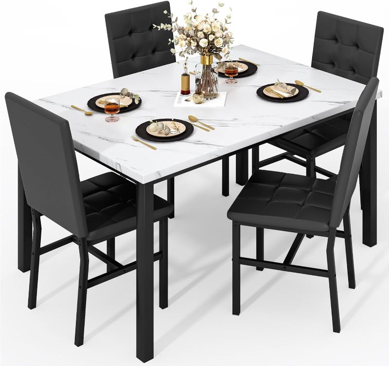 Photo 1 of AWQM Dining Table Set for 4 with Modern Rectangular Faux Marble Table and 4 PU Upholstered Chairs Home Space Saving Furniture for Kitchens Dining Rooms and Small Spaces (Black)