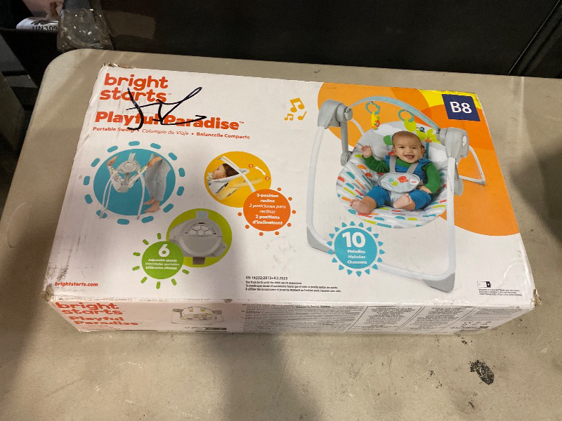 Photo 1 of Bright Starts Playful Paradise Portable Compact Automatic Baby Swing with Music, Unisex, Newborn +