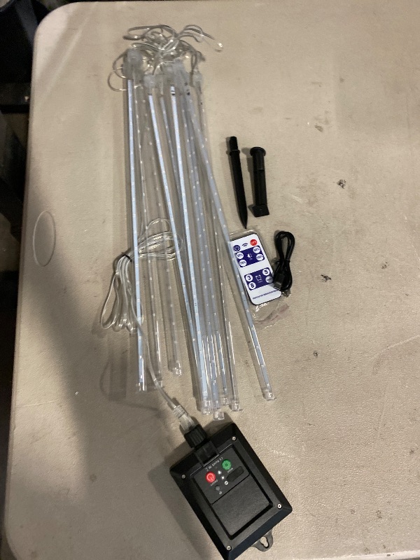 Photo 1 of Meteor Shower Lights - 20 Inch 10 Tube 540 LED Rain Falling Icicle Cascading Lights for Xmas Tree, Halloween, Patio, Garden, Eaves Decoration (Can Connect 100 Sets)