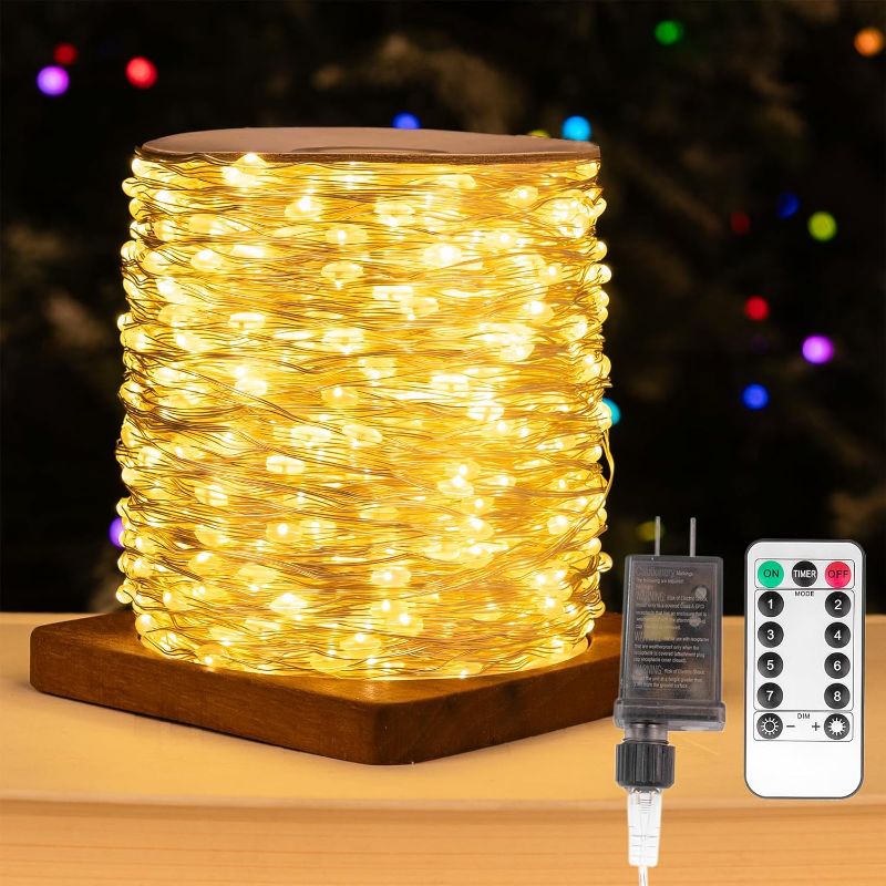 Photo 1 of Fairy Lights Plug in,100FT 300LEDs Waterproof Led String Lights,8 Modes Remote Twinkle Light for Outdoor Indoor Christmas Wedding Birthday Garden Party Decorations,Silver Wire,Warm White