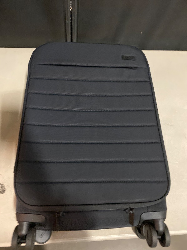 Photo 1 of Away Softside Carry-On Suitcase, 22 Inch Lightweight, Expandable High-Strength Nylon Luggage With Spinner Wheels, Meets Requirements for Most Major Airlines, Jet Black