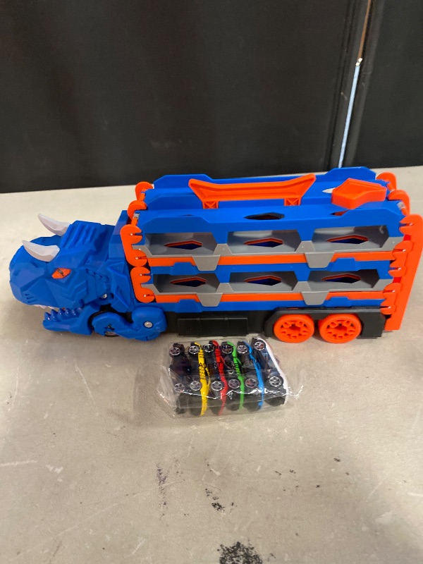 Photo 1 of Dinosaur Storage Ejector Car Toy Playset with 12 Mini Cars – Push-and-Go Vehicle Launcher & Storage Case for Kids Ages 2–7