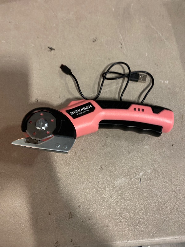 Photo 1 of Cordless Electric Scissors: 4V Rechargeable Cardboard Cutter, 3 Blades, Safety Lock & LED Light, Box Cutter for Carton Carpet Plastic Fabric Leather (Pink)