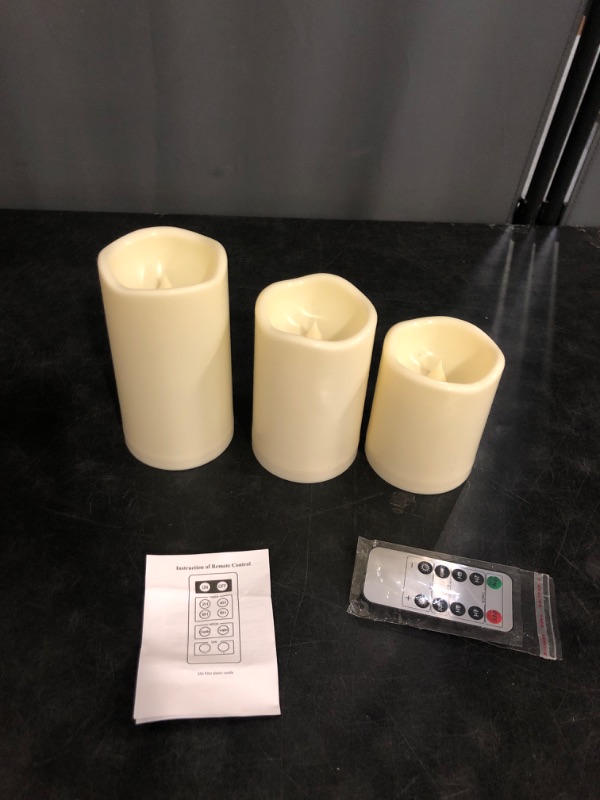 Photo 1 of Flameless Candles 4" 5" 6" Set of 3 Ivory Outdoor Indoor Pillars 3" Diameter Battery Operated Flickering Candles Include 10-Key Remote Timer Function 400+ Hours Requires 2 AA Batteries