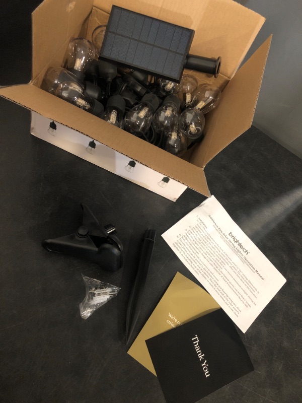 Photo 1 of Brightech Ambience Pro - 48 Ft Waterproof, Solar Power Outdoor String Lights - 1W LED Hanging Edison Bulbs Create Bistro Ambience in Your Yard - Commercial Grade, Shatterproof - 15 Lights, Soft White