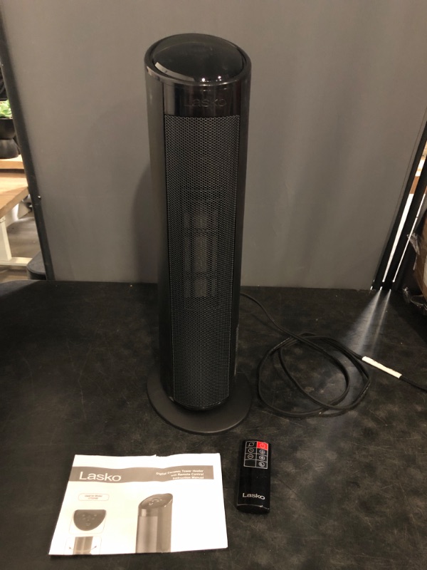 Photo 1 of Lasko - 22" Electric Ceramic Tower Heater with Timer and Powerful 1500W: Smart Heat for Your Home.