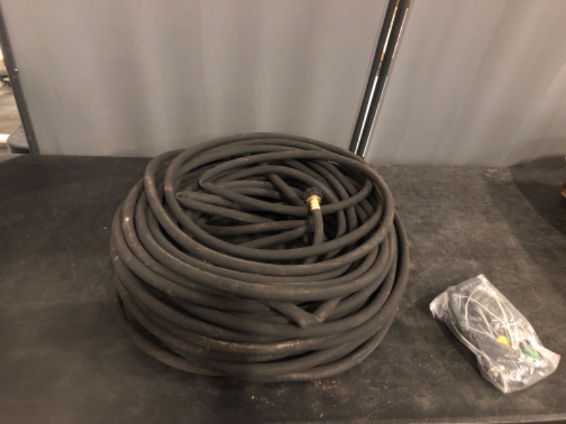 Photo 1 of Flexon 5/8" x 100Ft Premium Rubber Garden Hose – Heavy-Duty, Commercial-Grade, All-Weather Flexibility, High Burst Strength, Crush-Proof Couplings, Kink-Resistant, Ideal for Landscaping and Job Sites