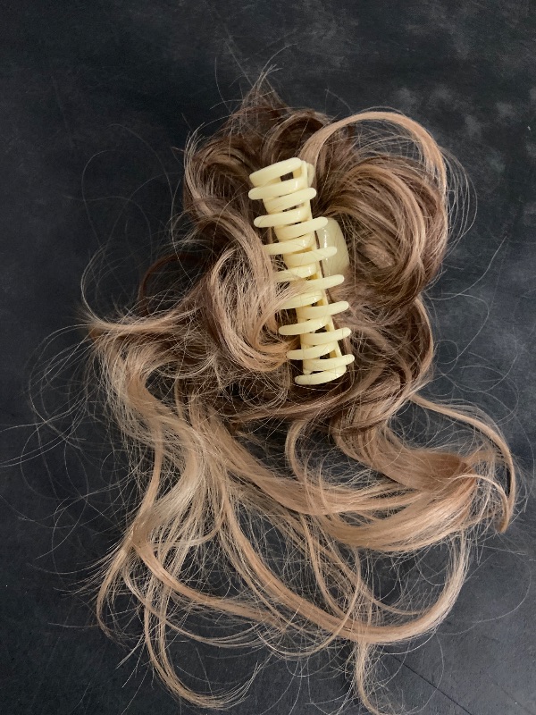 Photo 1 of Large Messy Bun Hair Pieces for Women Wavy Curly Fake Hair Bun Extensions Ponytail Hairpieces for Updo Natural Synthetic Claw Clip Bun Hair Accessories Light Brown mix Blonde
