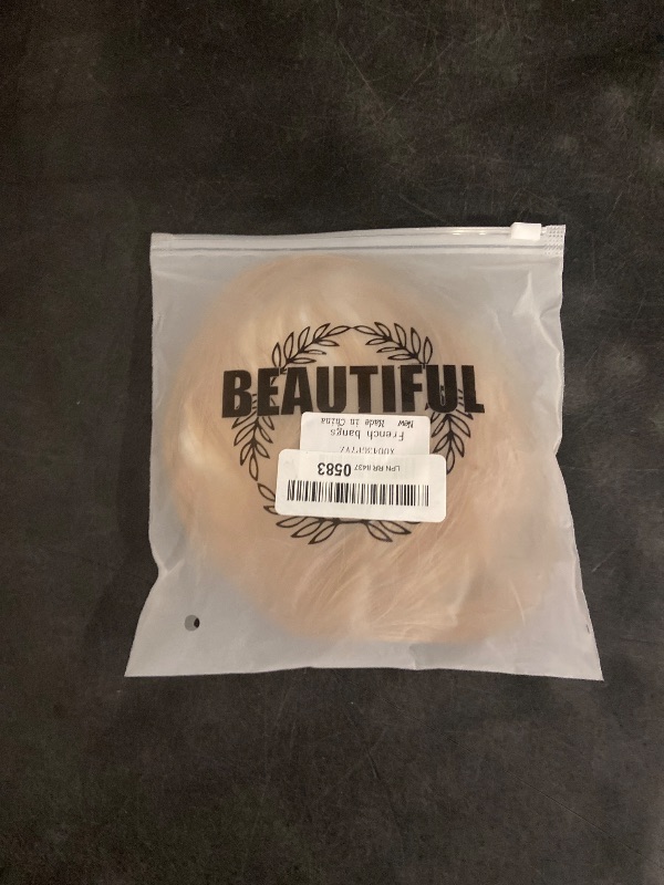 Photo 1 of Human Hair Bangs Clip in Hair Extensions - Faux Blonde Wispy Bangs with Temples for Daily Wear