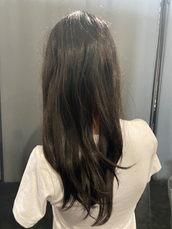 Photo 1 of topshe Long Black Wavy Wig With Bangs for Women 24 Inch Curly Wavy Wig With Bangs Natural Looking Synthetic Heat Resistant Fiber Wig for Daily Party & Cosplay Use