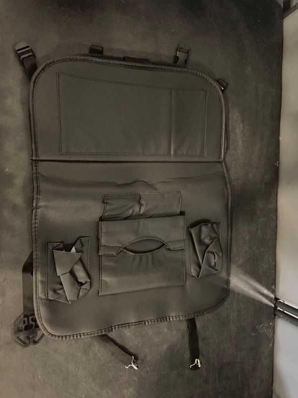 Photo 1 of Premium PU Leather Backseat Seat Organizer with Foldable Table, Multi-Storage Pockets and Adjustable Buckle Strap for Automobiles 1seat.