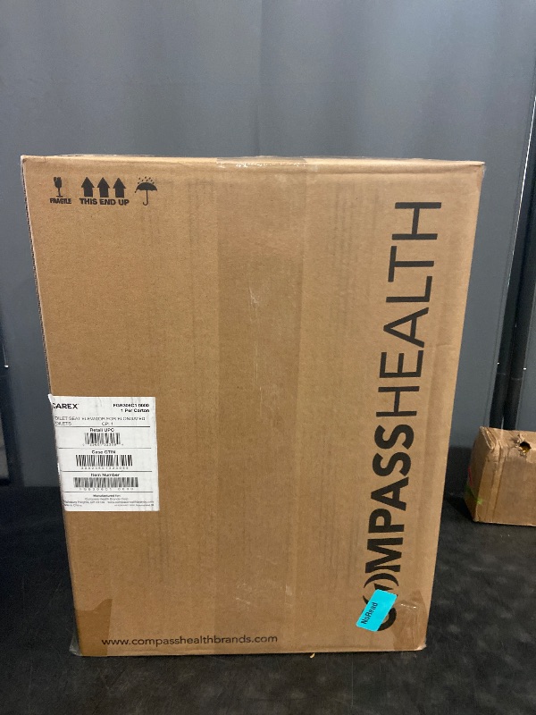 Photo 1 of Carex Toilet Seat Riser, Elongated Raised Toilet Seat Adds 3.5 inches to Toilet Height, for Assistance Bending or Sitting, 300 Pound Weight Capacity Toilet Riser