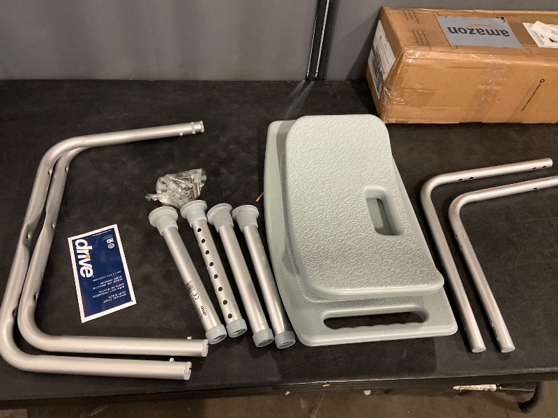 Photo 1 of Drive Medical RTL12202KDR Shower Chair with Back, Adjustable Stool with Suction Feet, Shower Seat for Inside Shower or Tub, Bathroom Bench Bath Chair for Elderly and Disabled, 300 LB Weight Cap, Grey
