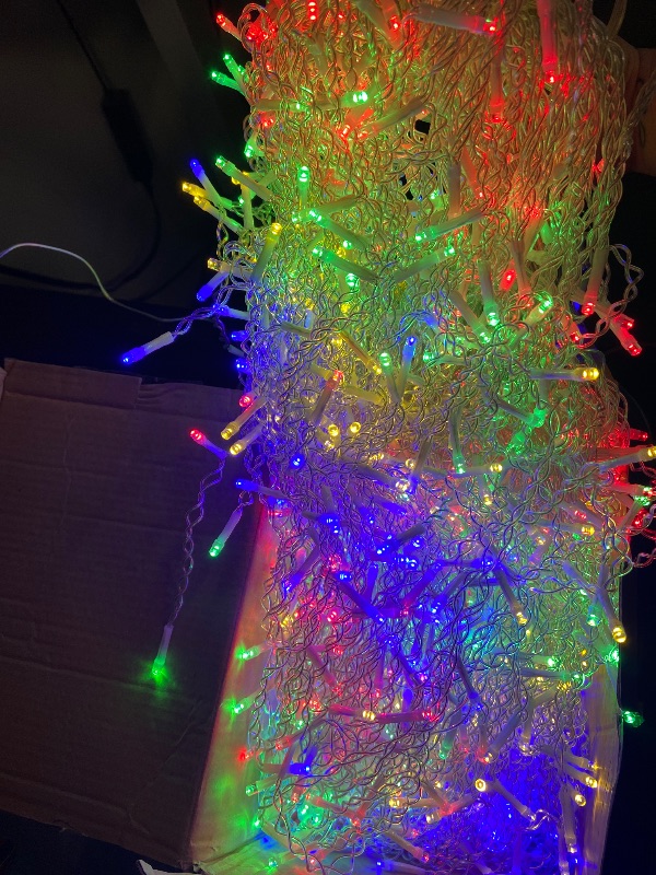 Photo 1 of Dazzle Bright Christmas Icicle Lights, 88.5 FT 1080 LED 8 Modes Curtain Fairy Lights with 180 Drops, Xmas String Lights for Outdoor Holiday Wedding Party Decorations (Multi-Colored)
