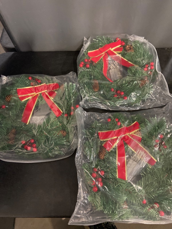 Photo 1 of 3 Pack 16 Inch Christmas Wreath Decorations with Lights Battery Operated 50 LED Artificial Christmas Wreath for Front Door with Red Bow Pine Cones Berry for Outdoor Indoor Window Wall Decor