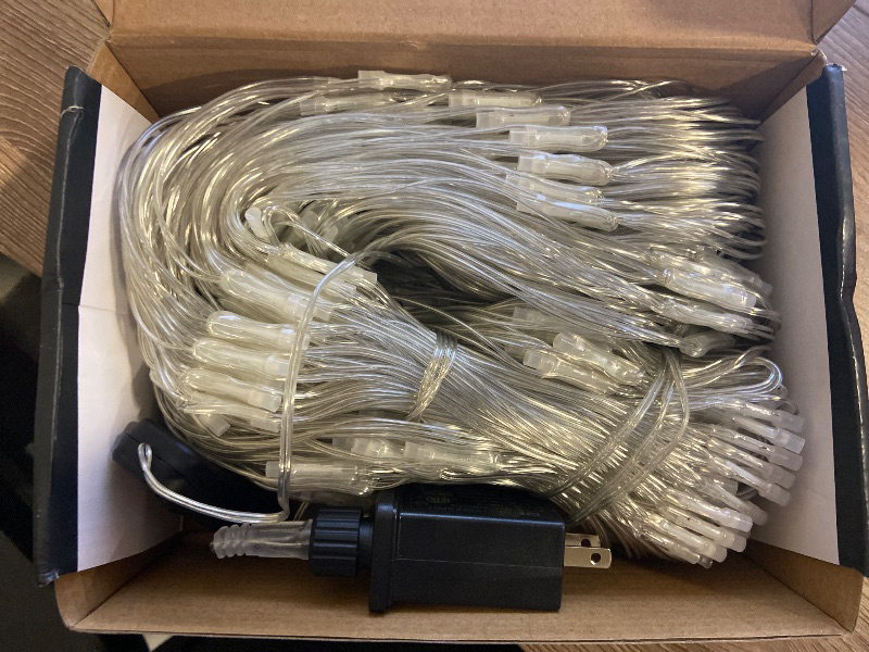 Photo 1 of Dazzle Bright Smart Christmas 360 LED Net Lights, 12FT x 5FT RGB Color Changing String Lights Clear Wire with Remote & APP Control, Christmas Decoration for Indoor Outdoor Xmas Party Yard Garden Decor