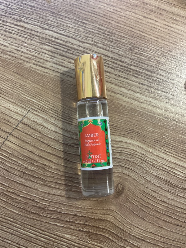 Photo 1 of Amber Perfume Oil Roll-On – Long Lasting Alcohol Free Amber Oil Perfume for Women and Men, Essential Oil Based Fragrance, Clean Vegan Body Oil Roll On, 10 ml / 0.33 fl Oz