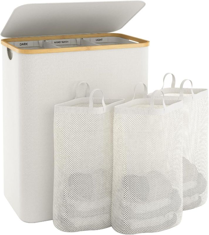 Photo 1 of Extra Large 3 Section Dirty Clothes Laundry Basket with Lid, Dirty Clothes Hampers with Removable Bags for Bedroom and Laundry Room, Beige