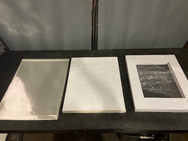 Photo 1 of Falling in Art 25 Pack Acid-Free 16x20" White Picture Mats Board Show Kit for 11x14" Pictures, 4-Ply Beveled Precut Photo Boards with Backing Boards and Plastic Clear Bags