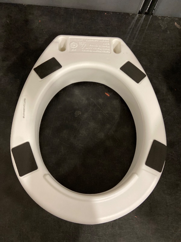 Photo 1 of Carex Toilet Seat Riser, Round Raised Toilet Seat Adds 3.5 inches to Toilet Height, for Assistance Bending or Sitting, 300 Pound Weight Capacity Toilet Riser